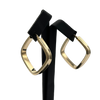 Gold hoop earrings on a white background